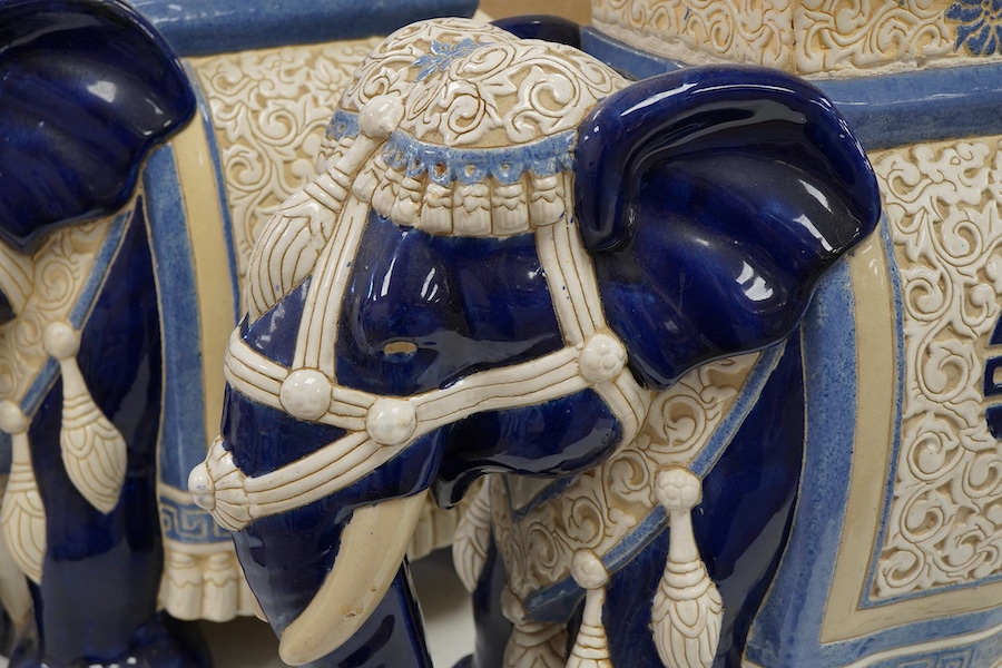 A pair of Chinese glazed earthenware 'elephant' stands, 42.5cm